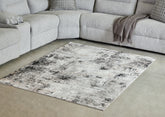 Bay Furniture Gallery - Ashley Furniture - Langwell Rug - 10' x 14' Rug / Black/Gray/White - R406780